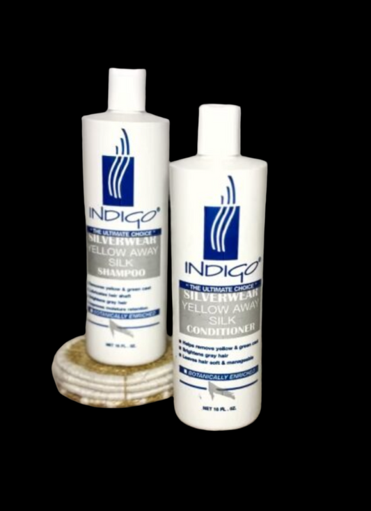Two bottles of Indigo shampoo and conditioner with a white background